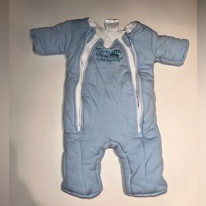 Baby Merlin’s magic sleepsuit swaddle